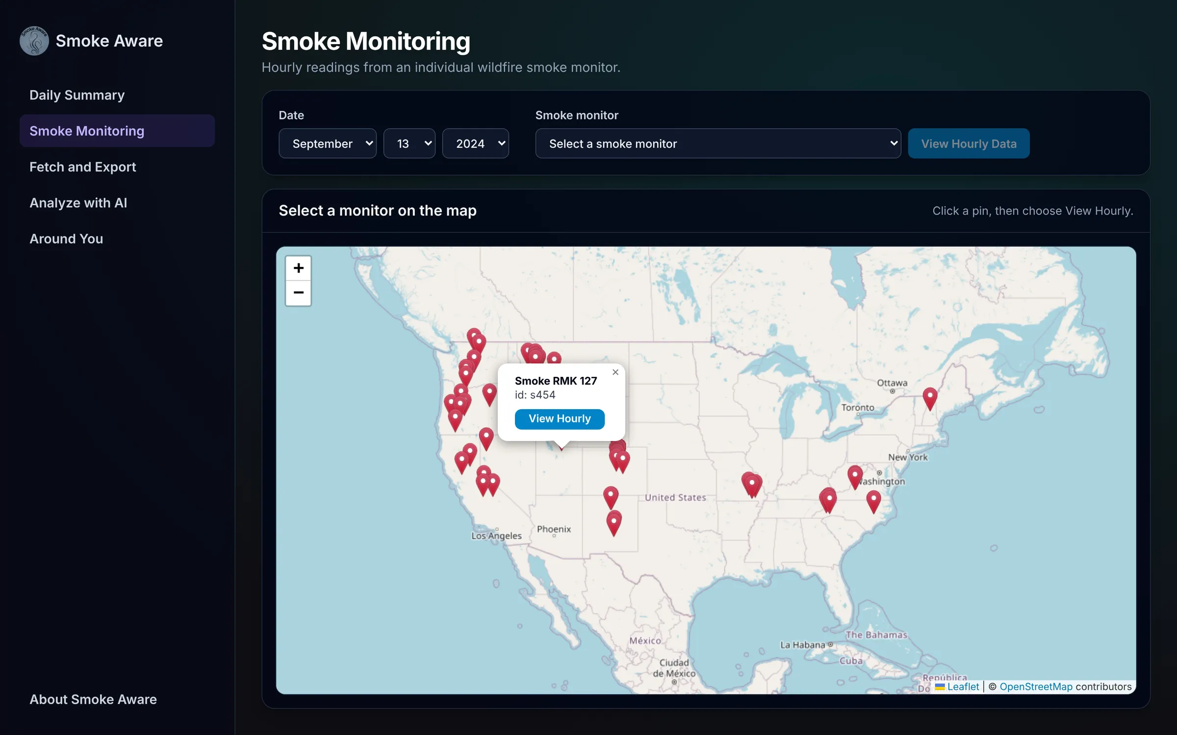 Current Smoke Monitoring page with a sidebar, a map of 99 monitor stations and a popup for one station